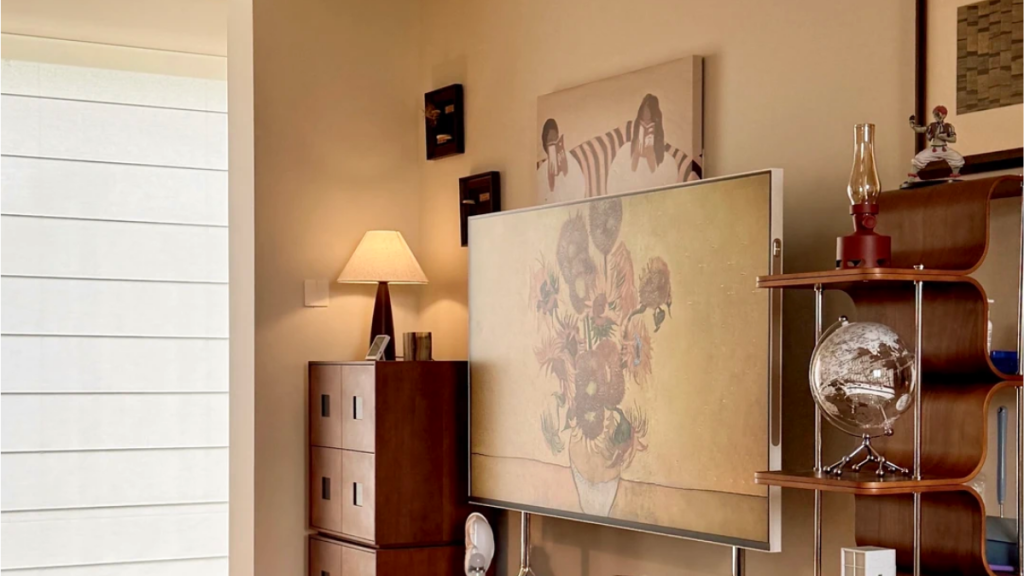 Large artwork creating a visual anchor on a beige rental wall