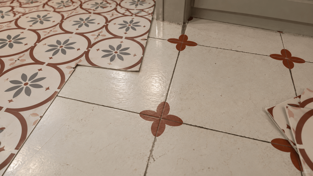 Existing rental floor surface before peel-and-stick tile installation