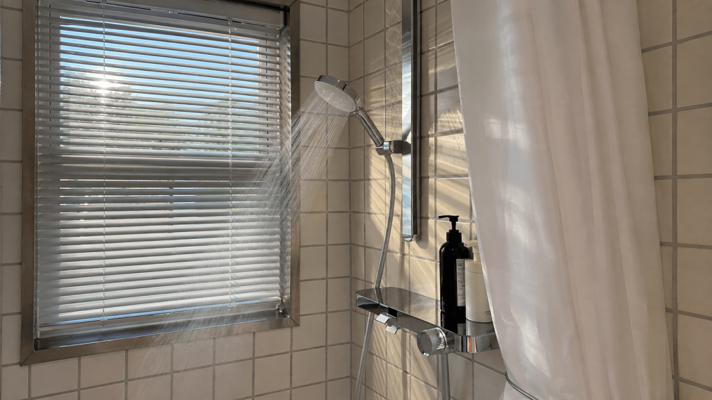 Water spray from a basic rental showerhead