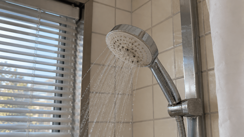 Mineral buildup on an existing rental showerhead