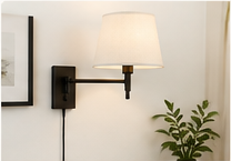 Plug-in wall sconce installed near a wall outlet