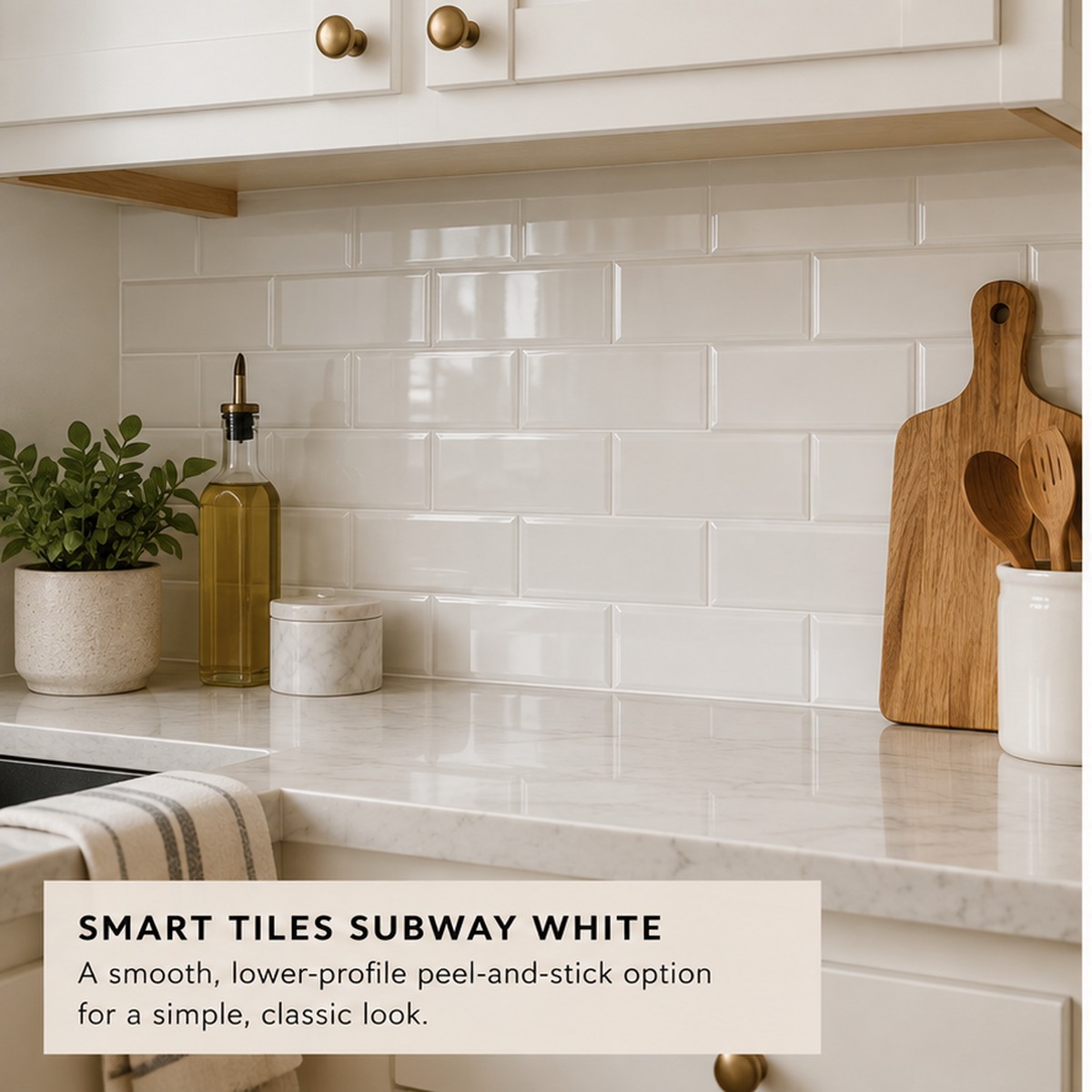 White subway-style peel and stick backsplash in a small rental kitchen