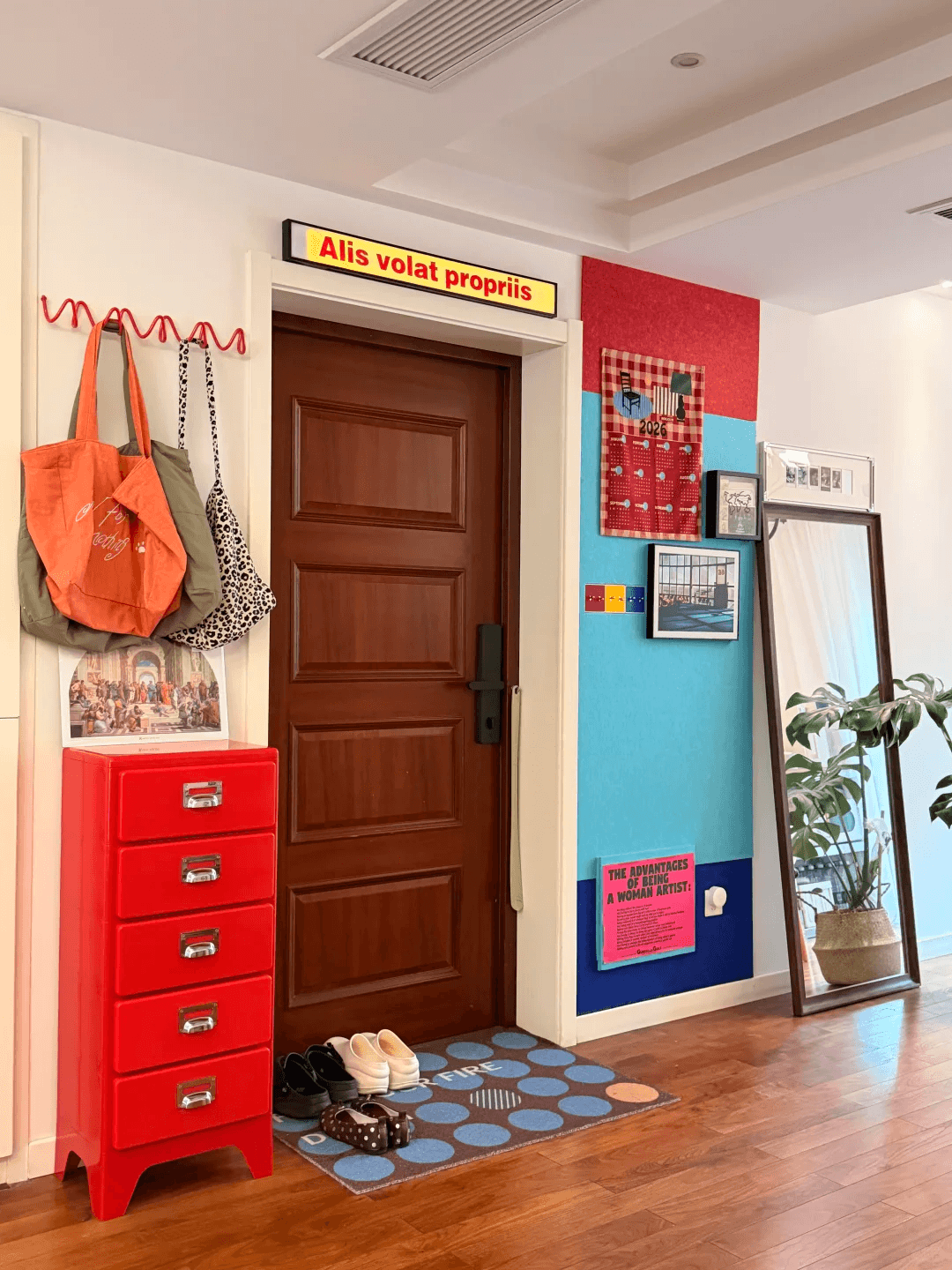 Small apartment entryway with everyday storage